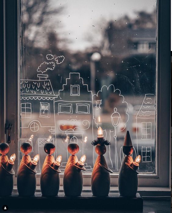 Jõulumeeleolus aknamaalingud